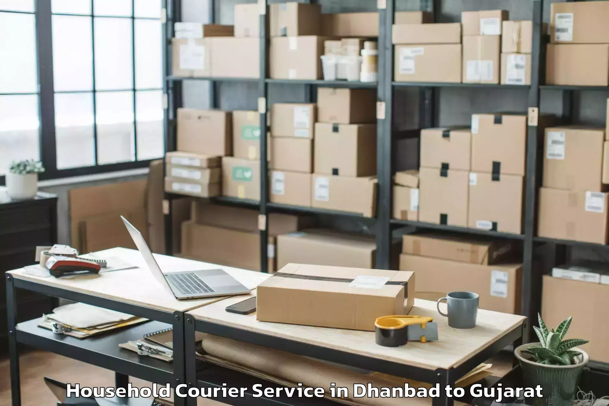 Trusted Dhanbad to Kaprada Household Courier